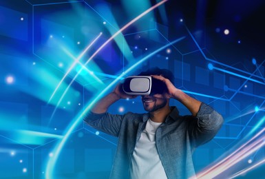 Image of Man using virtual reality headset. Cyberspace around him