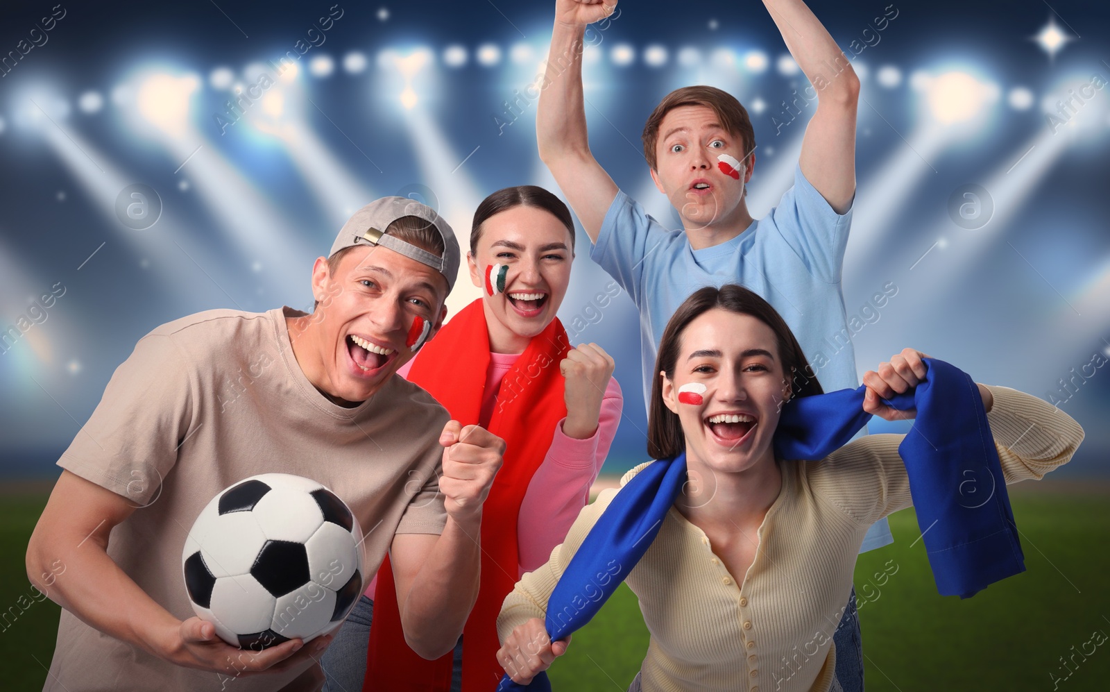 Excited football fans with flags painted on their faces at stadium Image of Excited football fans with flags painted on their faces at stadium