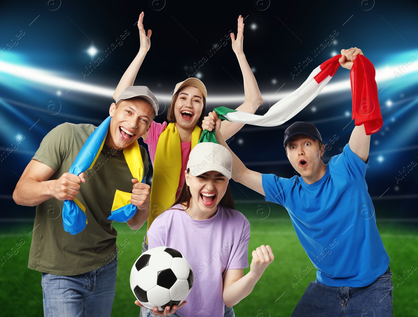Excited football fans with flags on stadium Image of Excited football fans with flags on stadium