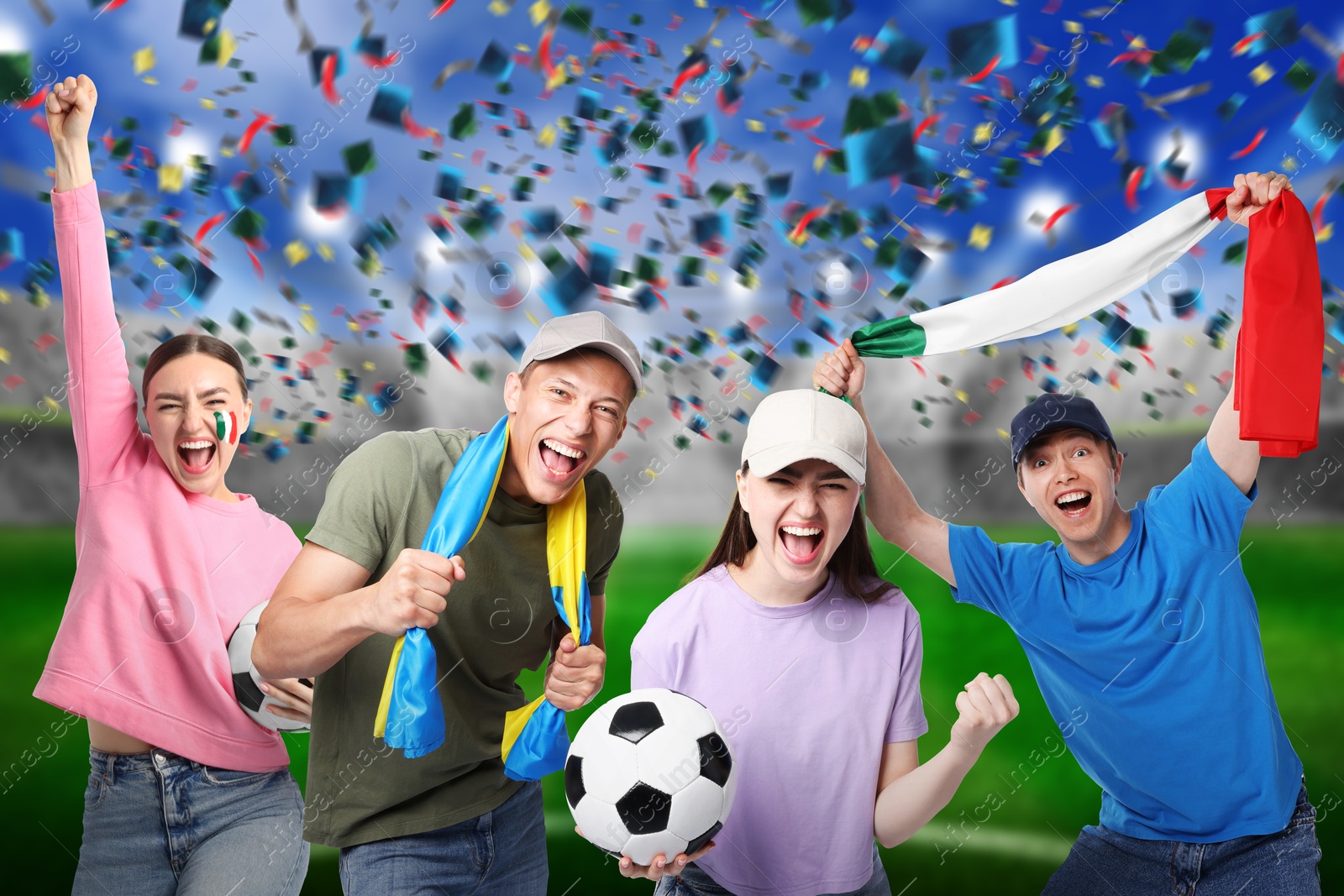 Excited football fans under falling confetti at stadium Image of Excited football fans under falling confetti at stadium