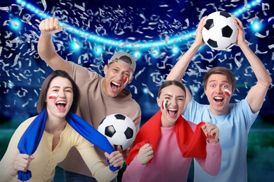 Image of Excited football fans with flags painted on their faces under falling confetti at stadium