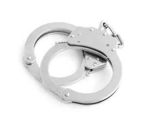 Photo of Handcuffs on white background, above view. Police equipment