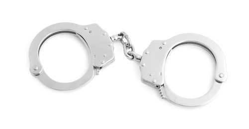 Photo of Handcuffs on white background, top view. Police equipment