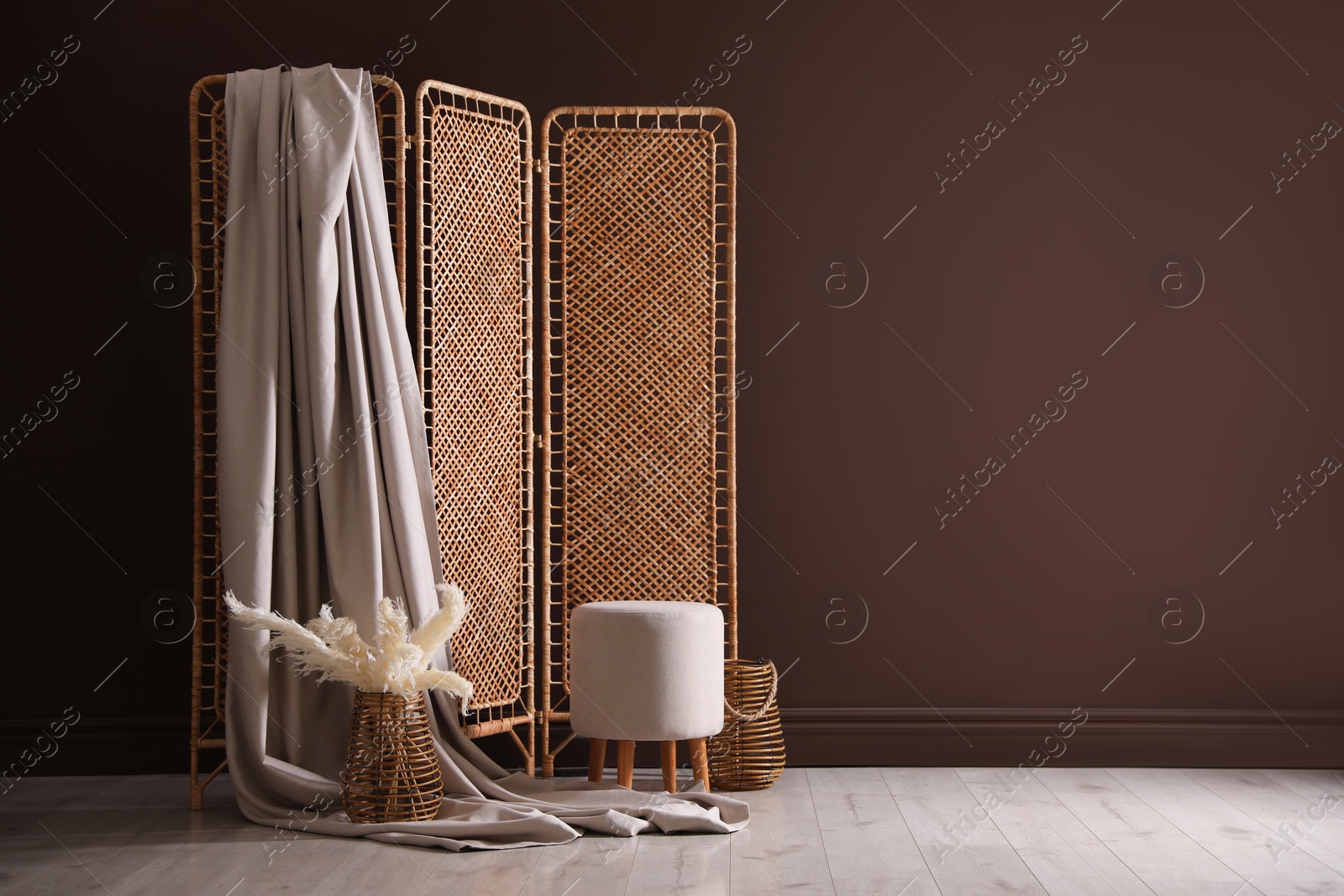 Photo zone with stylish folding screen in studio Photo of Photo zone with stylish folding screen in studio