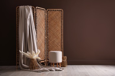 Photo of Photo zone with stylish folding screen in studio