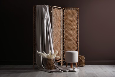 Photo of Photo zone with stylish folding screen in studio