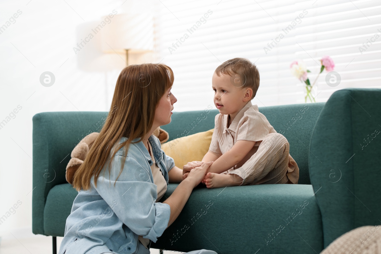 Mother spending time together with her son at home Photo of Mother spending time together with her son at home