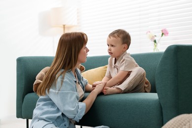 Photo of Mother spending time together with her son at home