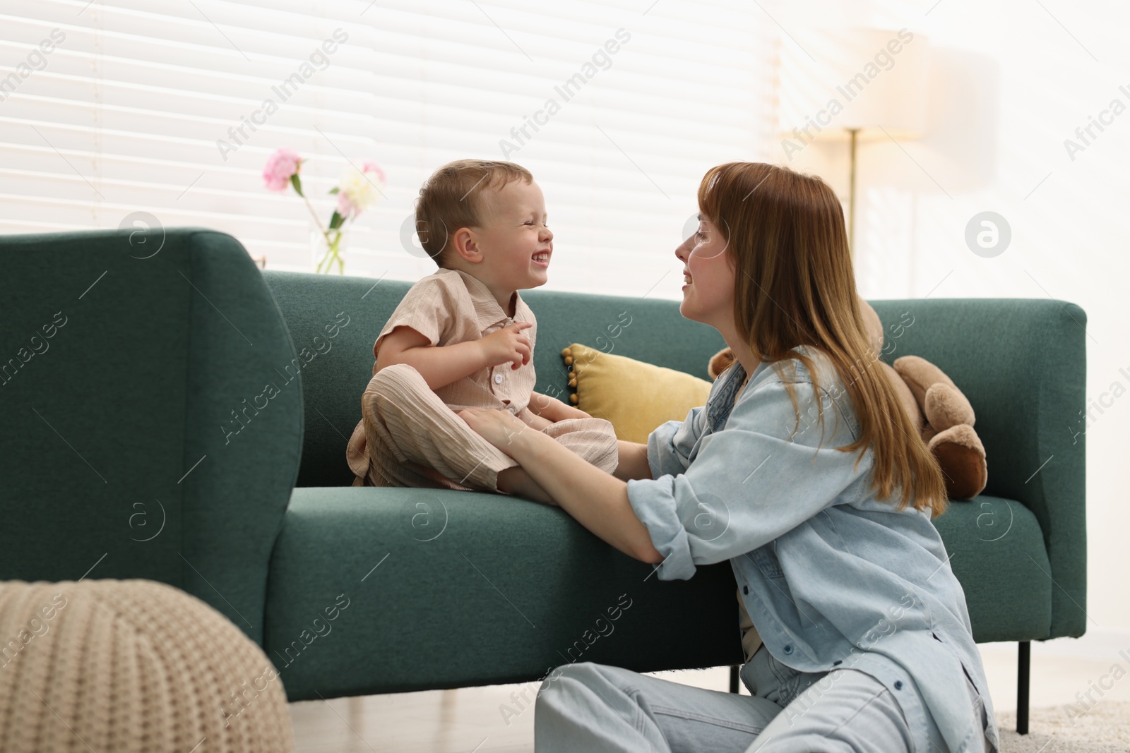 Happy mother spending time together with her son at home Photo of Happy mother spending time together with her son at home