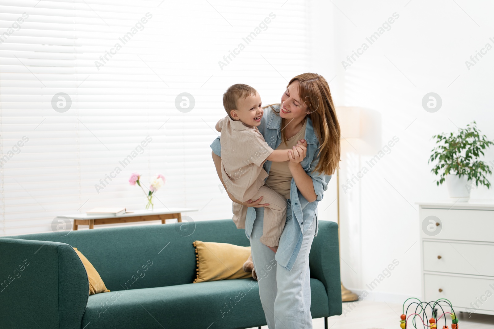 Happy mother spending time together with her son at home Photo of Happy mother spending time together with her son at home