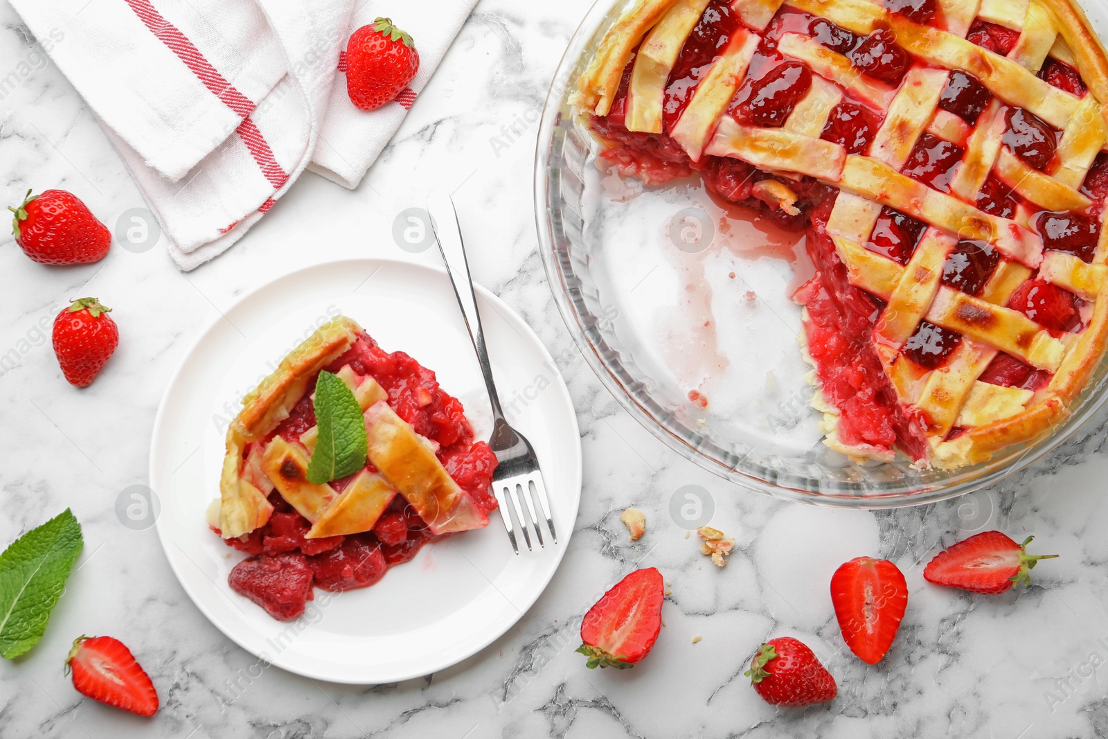 Tasty strawberry pie and berries on white marble table, flat lay Photo of Tasty strawberry pie and berries on white marble table, flat lay
