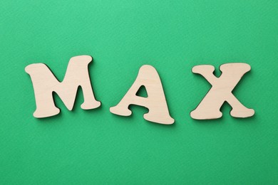 Photo of Word Max on green background, top view