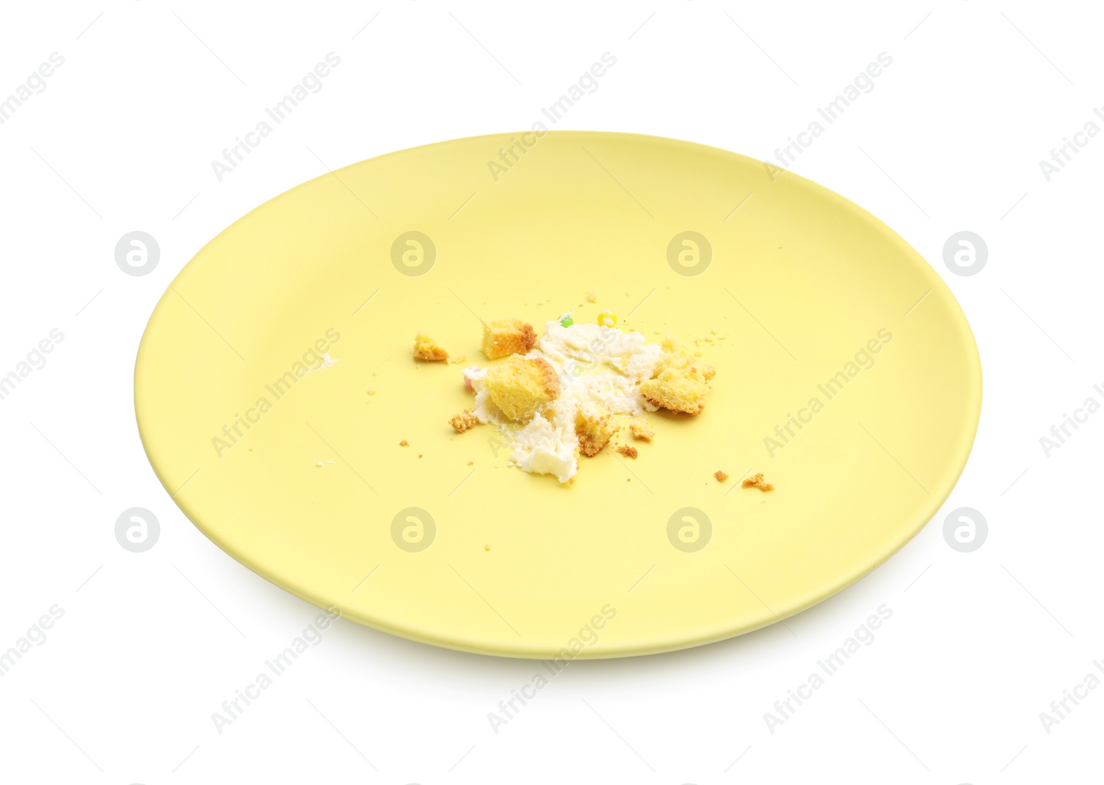 Dirty plate with crumbs and cream isolated on white Photo of Dirty plate with crumbs and cream isolated on white
