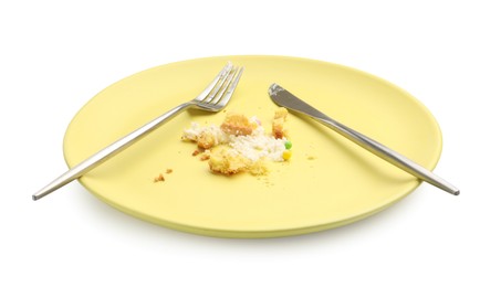 Photo of Dirty plate with crumbs, cream and cutlery isolated on white