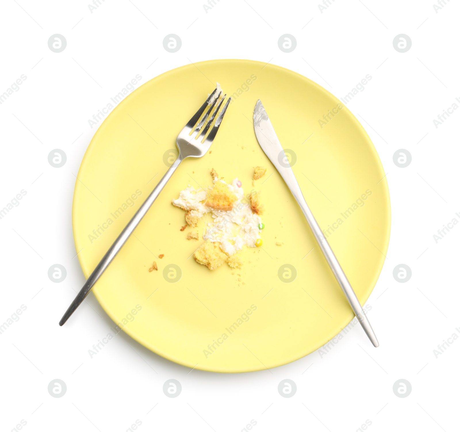 Dirty plate with crumbs, cream and cutlery isolated on white, top view Photo of Dirty plate with crumbs, cream and cutlery isolated on white, top view