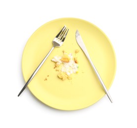 Photo of Dirty plate with crumbs, cream and cutlery isolated on white, top view
