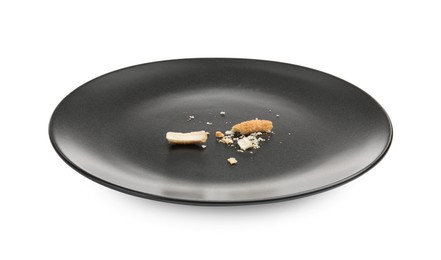 Photo of Dirty plate with bread crumbs isolated on white