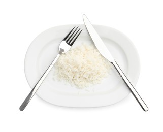 Photo of Plate with cooked rice and cutlery isolated on white, top view