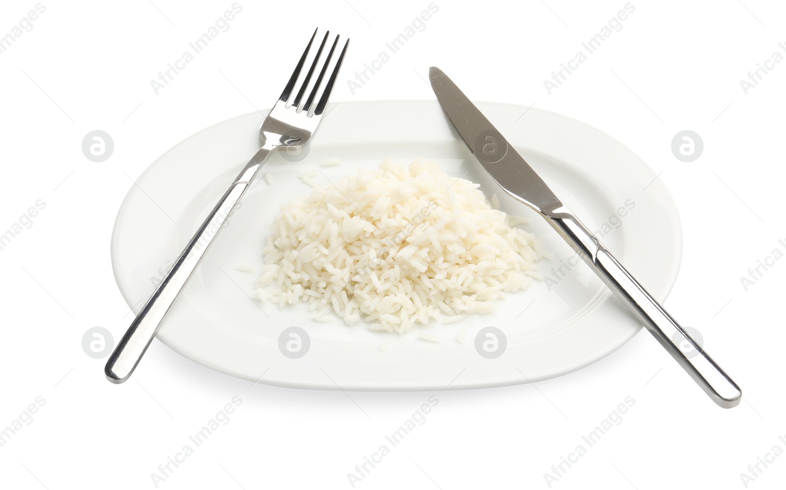 Plate with cooked rice and cutlery isolated on white Photo of Plate with cooked rice and cutlery isolated on white