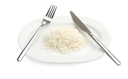 Photo of Plate with cooked rice and cutlery isolated on white