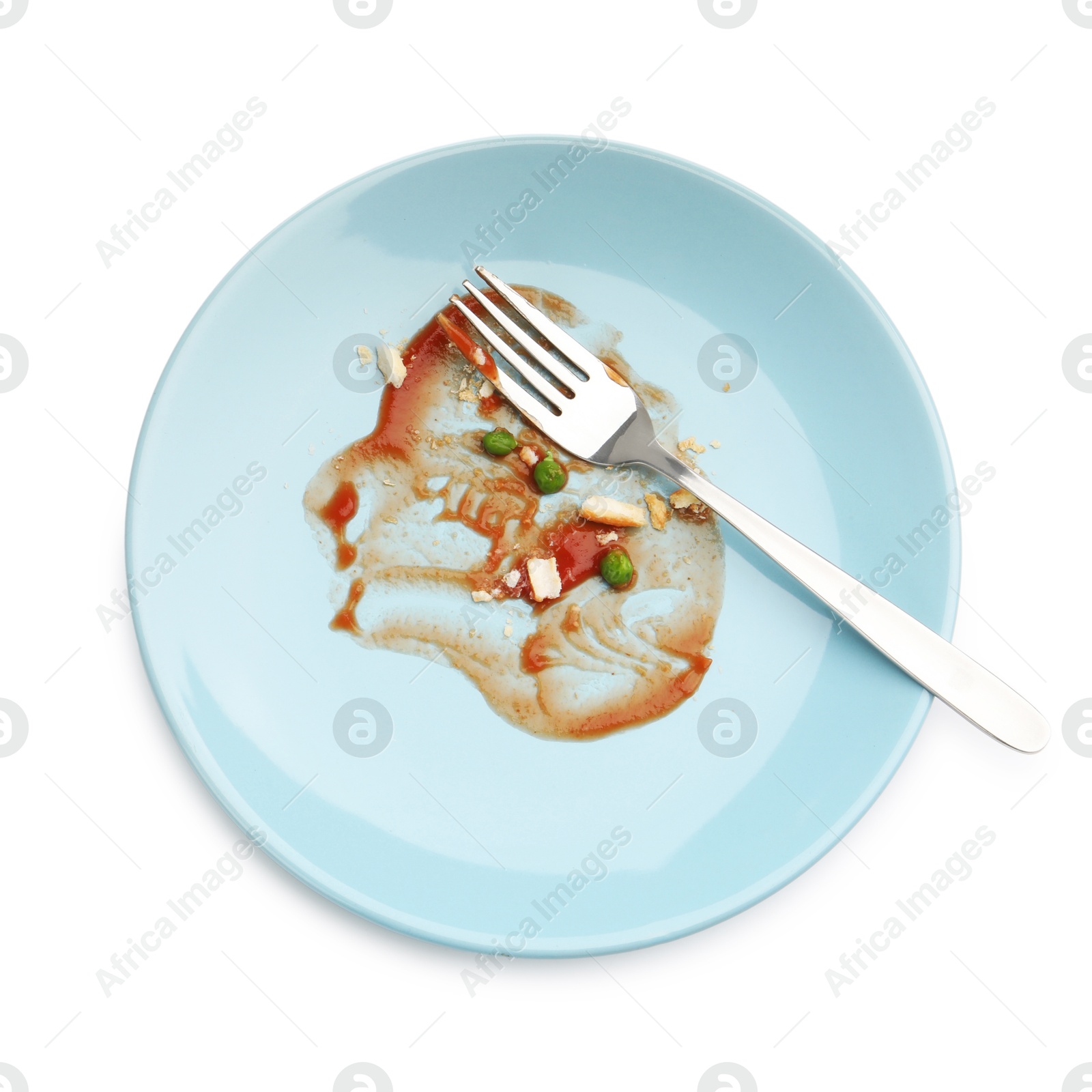 Dirty plate with tomato sauce, peas, bread crumbs and fork isolated on white, top view Photo of Dirty plate with tomato sauce, peas, bread crumbs and fork isolated on white, top view