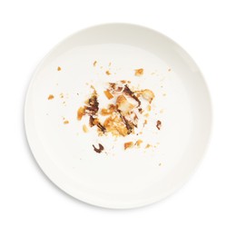 Photo of Dirty plate with crumbs and sauce isolated on white, top view