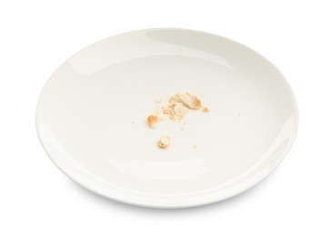 Photo of Dirty plate with bread crumbs isolated on white