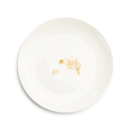 Photo of Dirty plate with bread crumbs isolated on white, top view