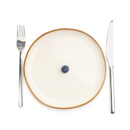 Photo of Plate with fresh blueberry and cutlery isolated on white, top view