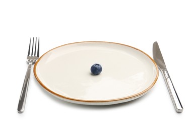 Photo of Plate with fresh blueberry and cutlery isolated on white