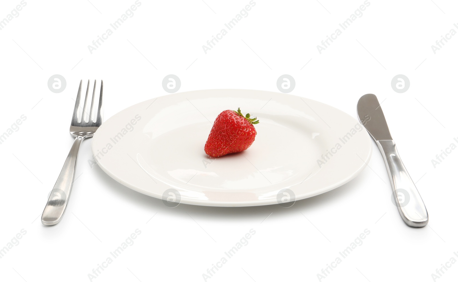Photo of Plate with fresh strawberry and cutlery isolated on white