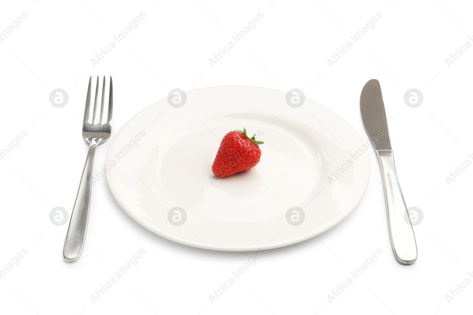 Plate with fresh strawberry and cutlery isolated on white Photo of Plate with fresh strawberry and cutlery isolated on white