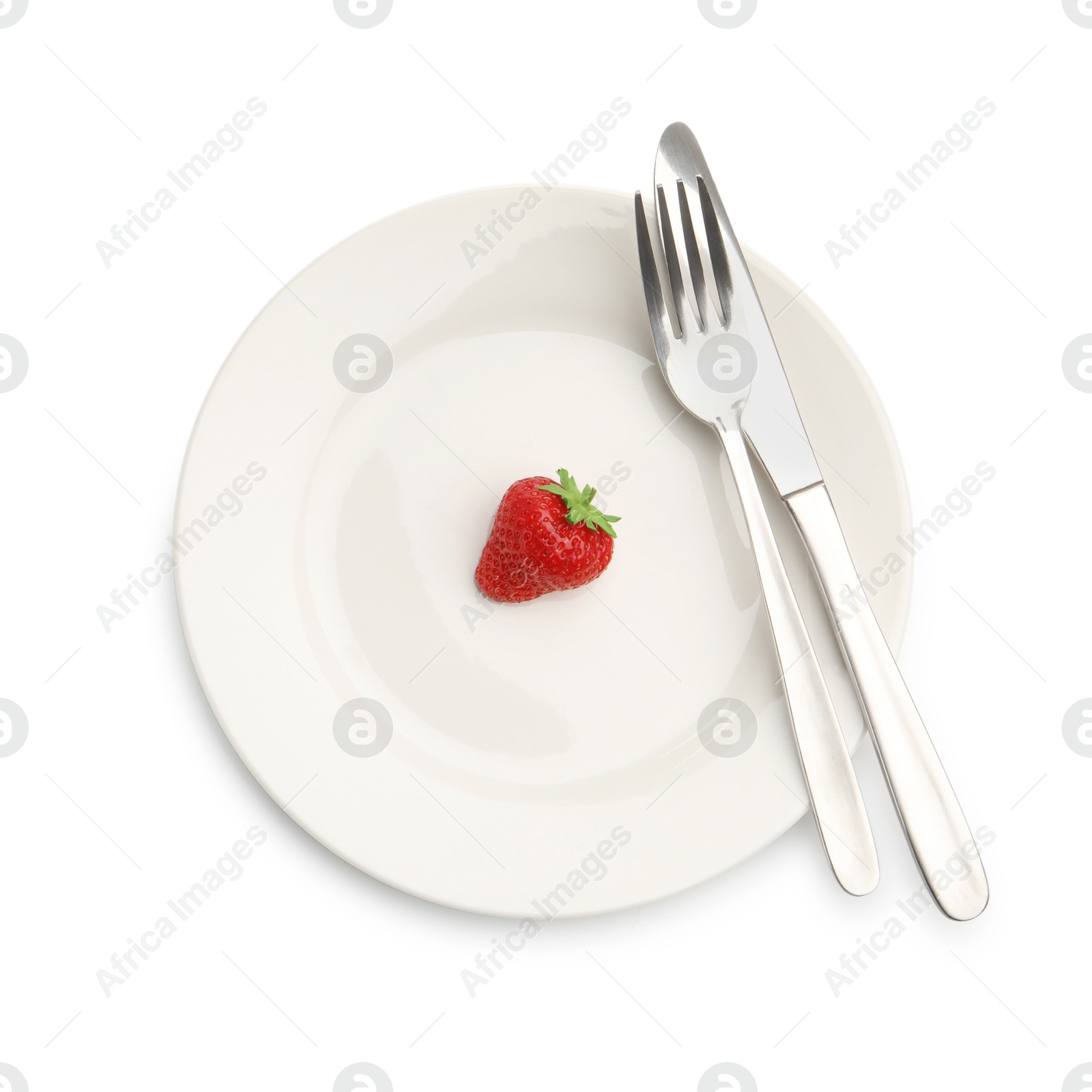 Plate with fresh strawberry and cutlery isolated on white, top view Photo of Plate with fresh strawberry and cutlery isolated on white, top view