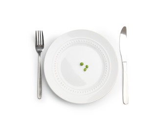 Photo of Plate with fresh green peas and cutlery isolated on white, top view