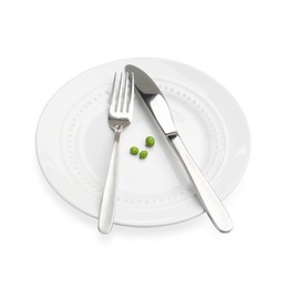Photo of Plate with fresh green peas and cutlery isolated on white