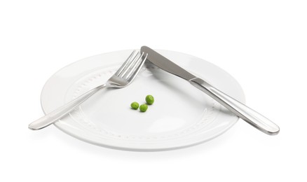 Photo of Plate with fresh green peas and cutlery isolated on white