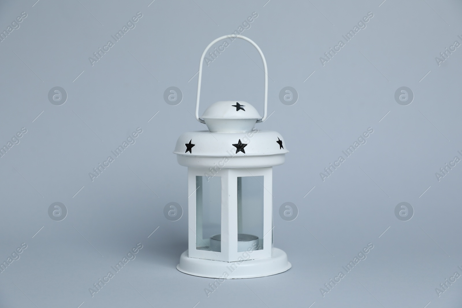 Photo of Beautiful white decorative lantern on light grey background