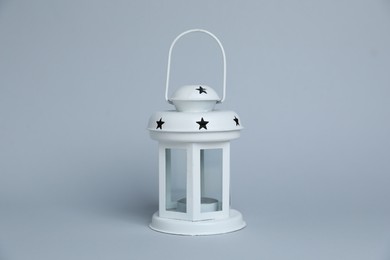 Photo of Beautiful white decorative lantern on light grey background
