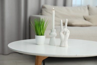 Photo of Different decor on white table at home