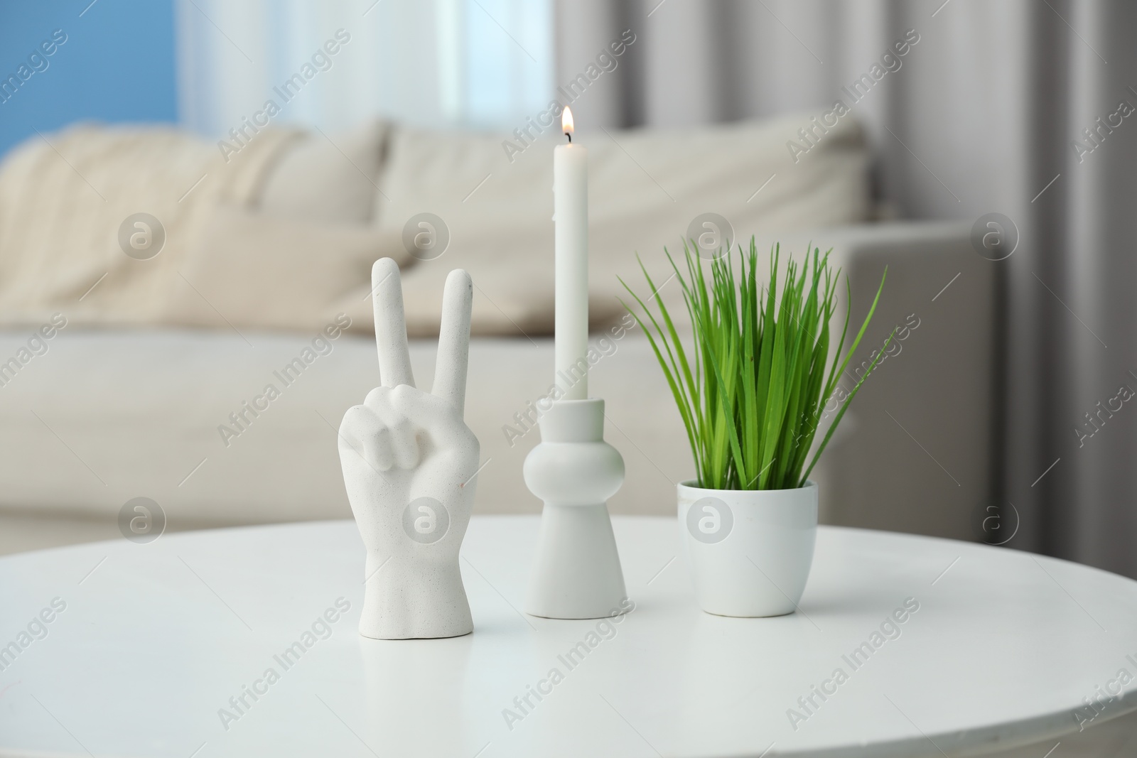 Photo of Different decor on white table at home