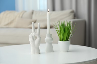 Photo of Different decor on white table at home