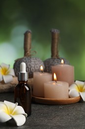 Photo of Composition with spa stones on grey table, closeup