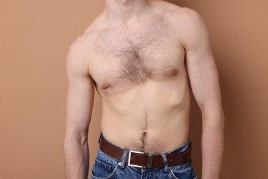 Photo of Man before scoliosis treatment on beige background