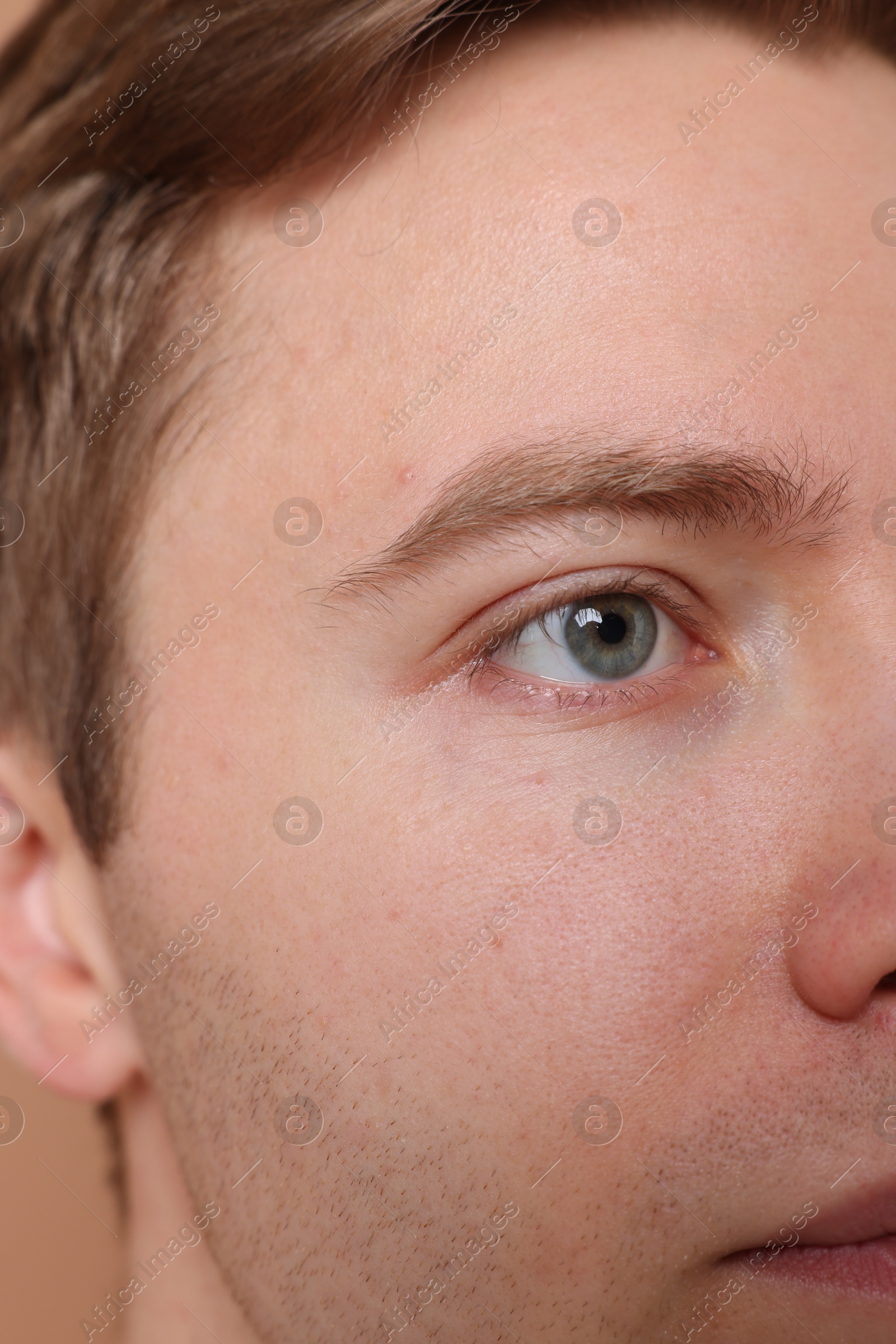 Handsome man with beautiful eyes, closeup view Photo of Handsome man with beautiful eyes, closeup view