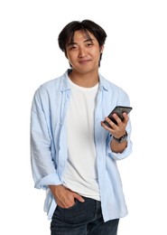 Photo of Portrait of handsome Asian man with smartphone on white background