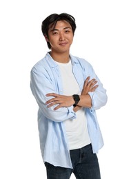 Photo of Portrait of handsome Asian man with crossed arms on white background