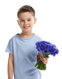 Photo of Smiling little boy with bouquet of beautiful cornflowers on white background