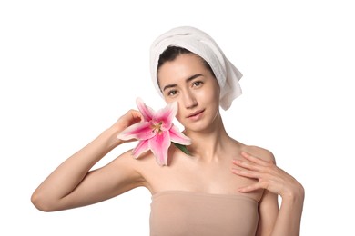 Photo of Portrait of beautiful woman with lily flower after spa treatment on white background