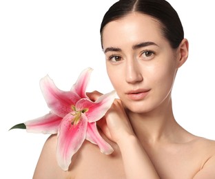 Photo of Portrait of beautiful woman with lily flower after spa treatment on white background, closeup