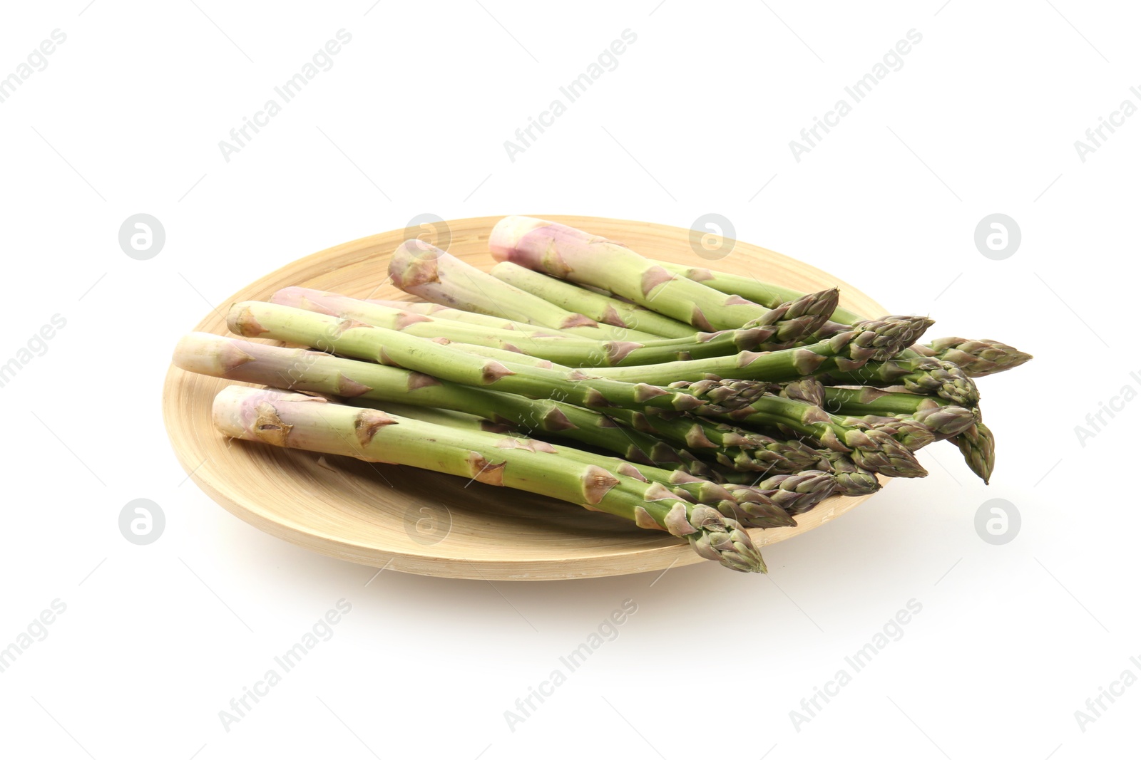 Fresh raw asparagus spears isolated on white Photo of Fresh raw asparagus spears isolated on white